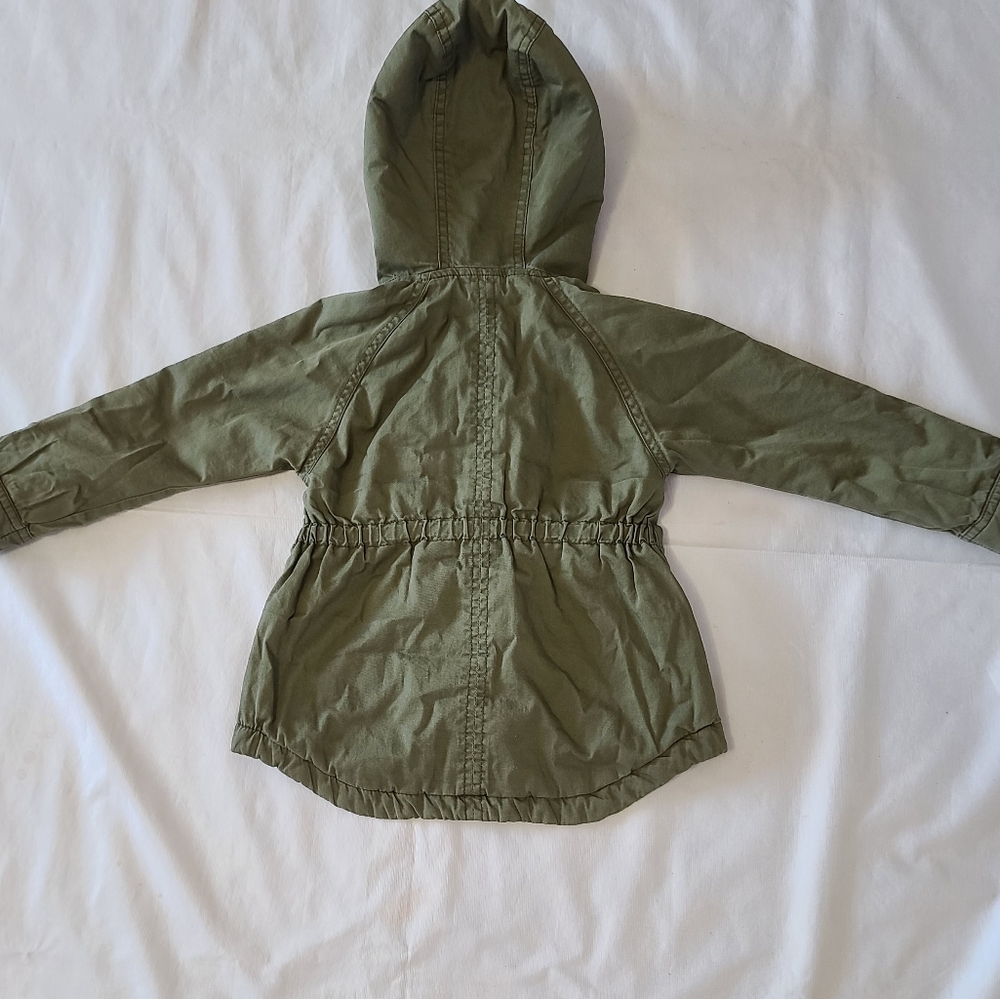 girls olive green coat with fur lined hood.